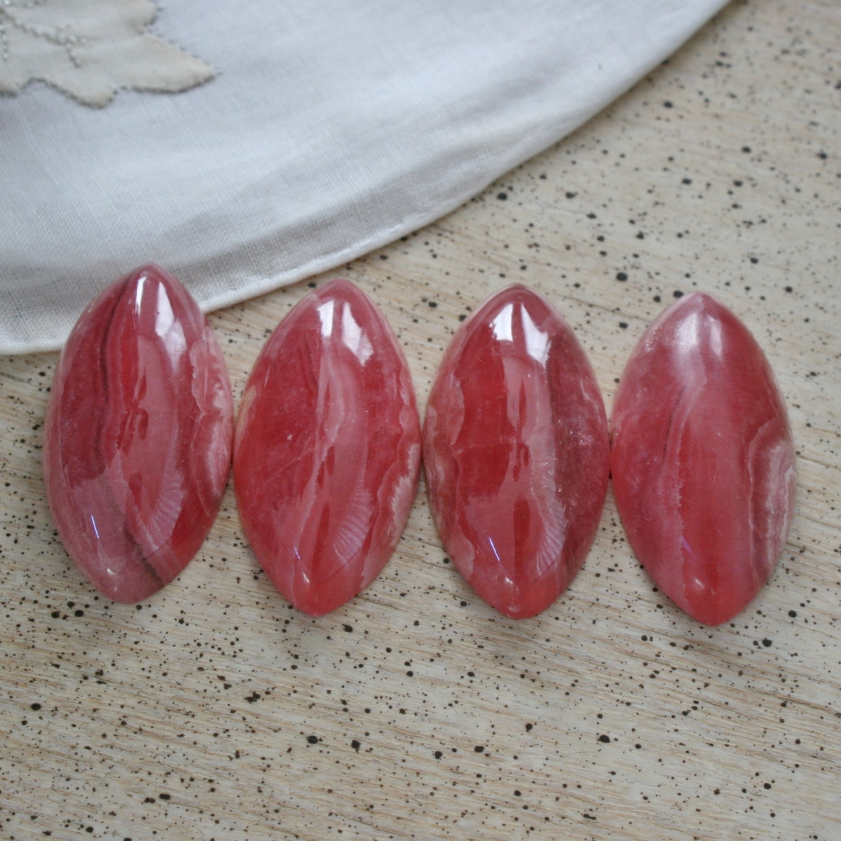 ONE Rhodochrosite Gemmy Marquise Cabochons from Argentina, 51 to 53 ct. each